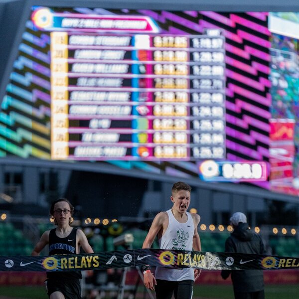Malachi breaking the tape at Oregon Relays